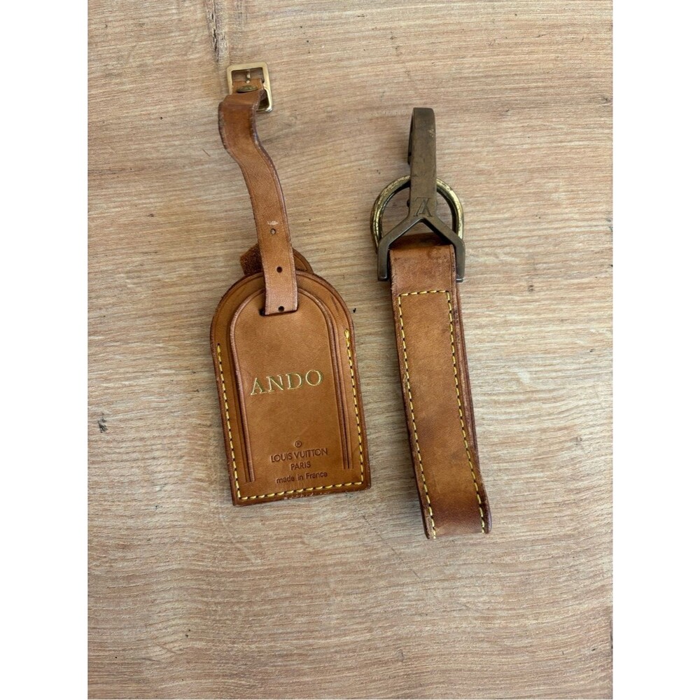 Authentic Louis Vuitton id tag and strap